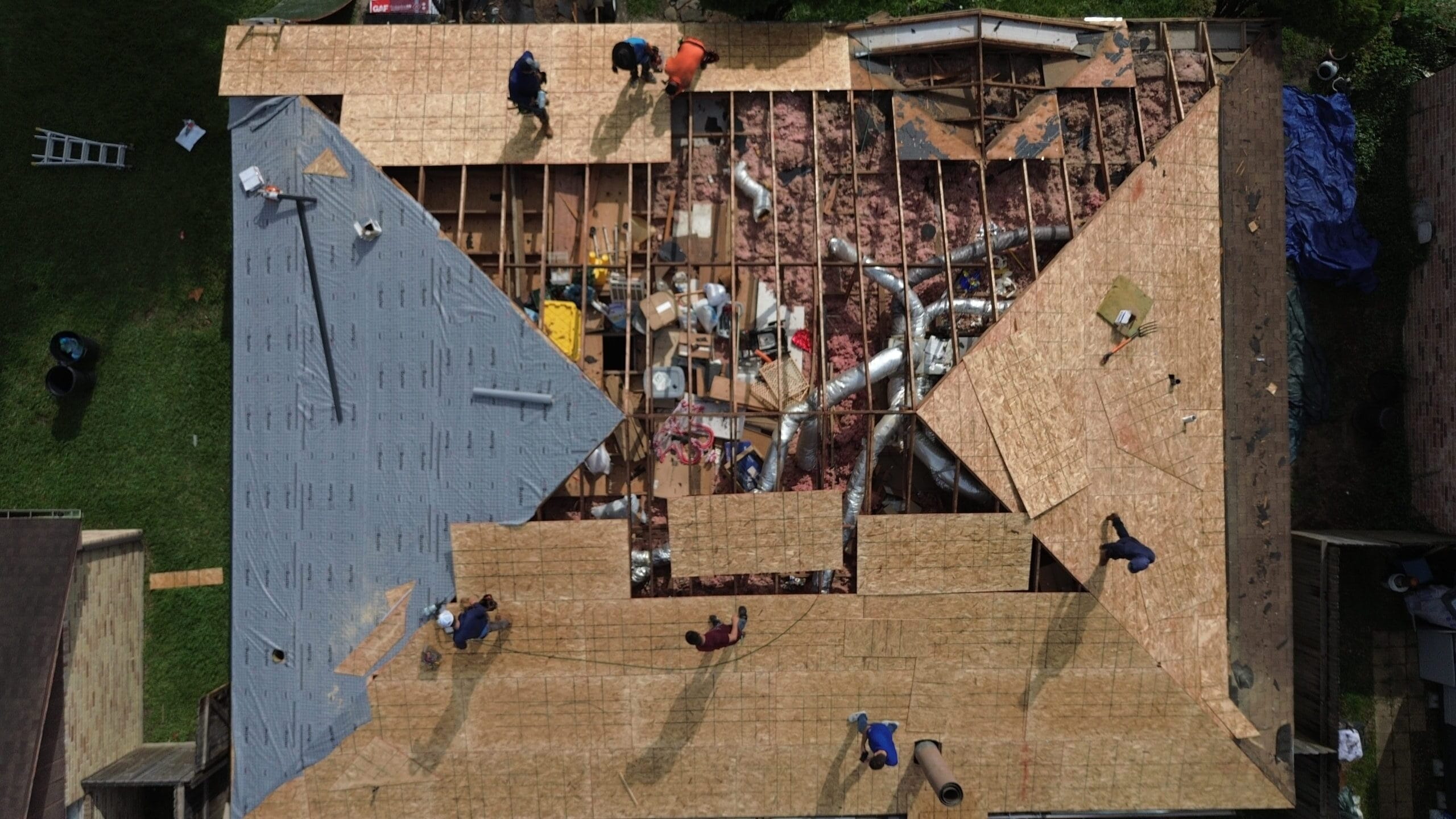 Urena Roofing crew at work on a Houston roof